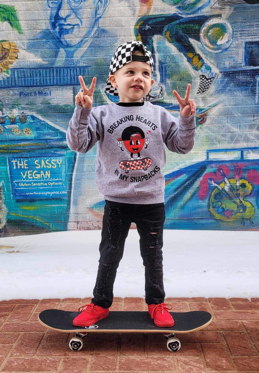 Breaking hearts in my snapbacks