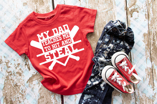 My dad teaches me to hit and steal