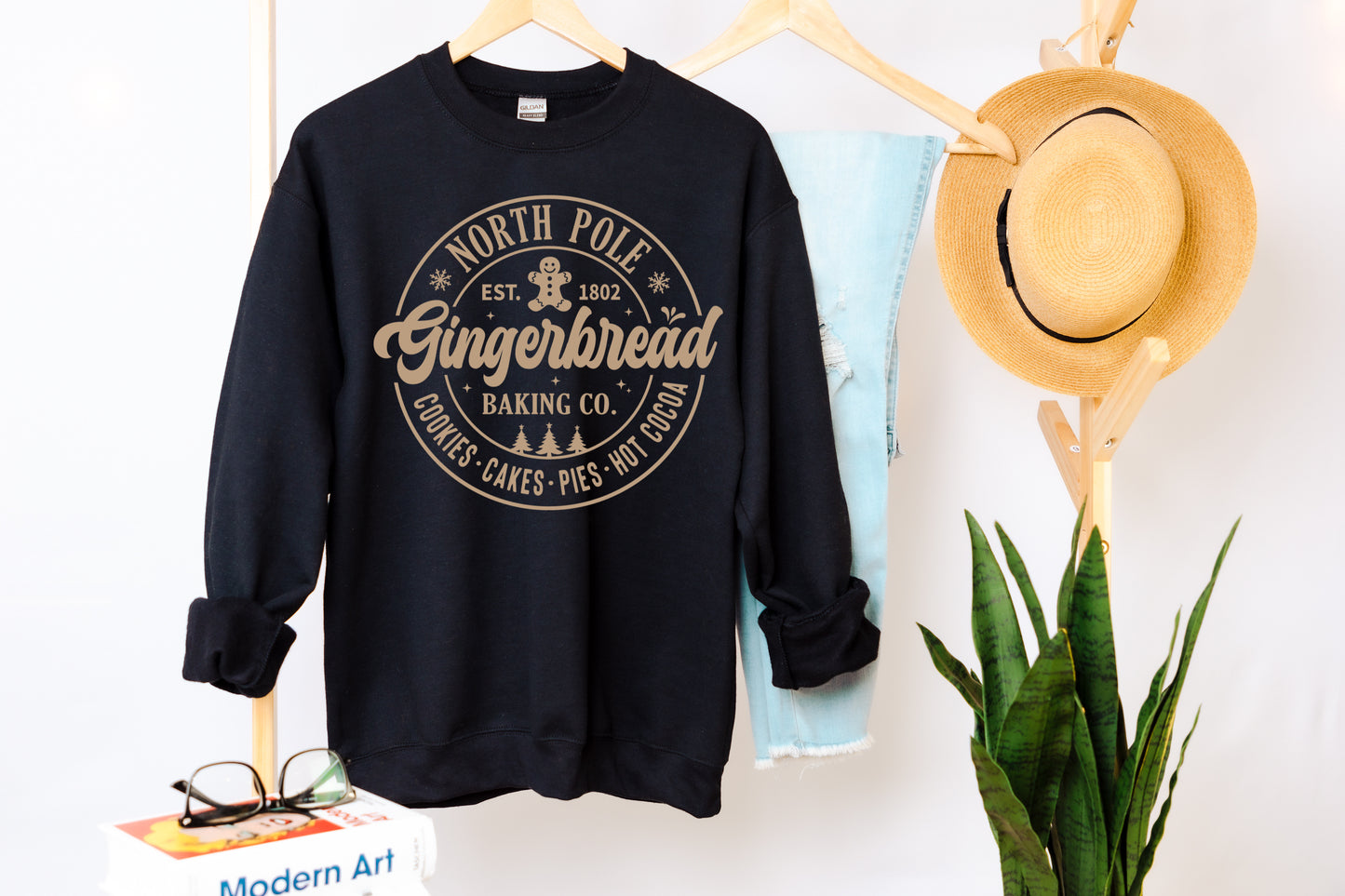 North Pole gingerbread baking co( black sweatshirt)