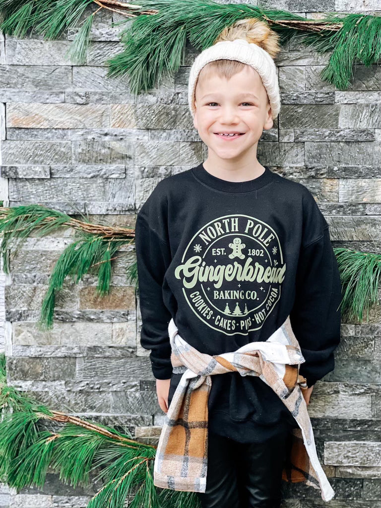 North Pole gingerbread baking co( black sweatshirt)