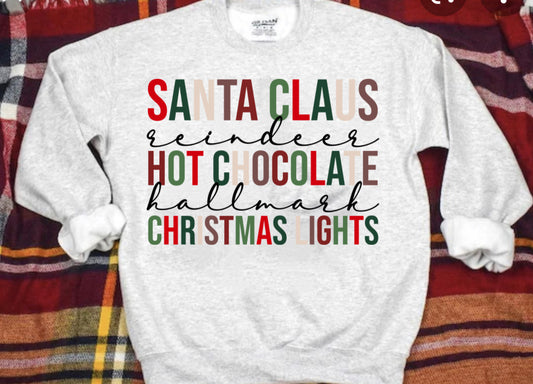 Santa Clause, reindeer, hot cocoa sweatshirt